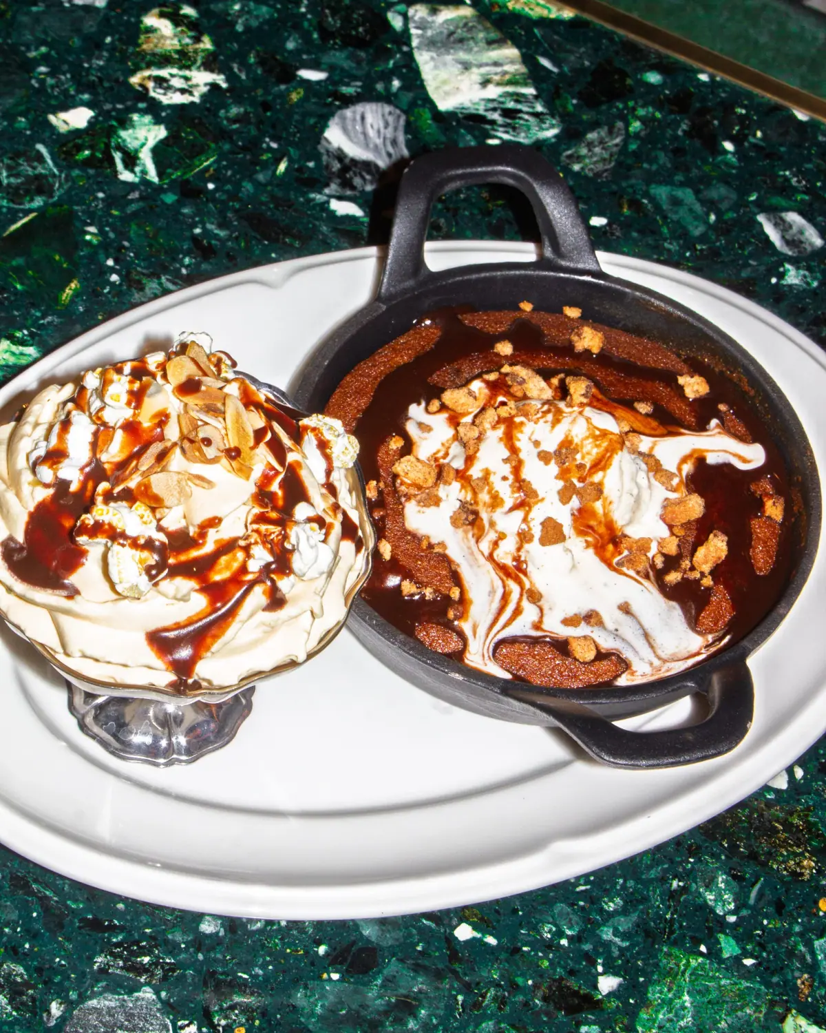 Giant skillet cookie served warm with a scoop of vanilla ice cream.