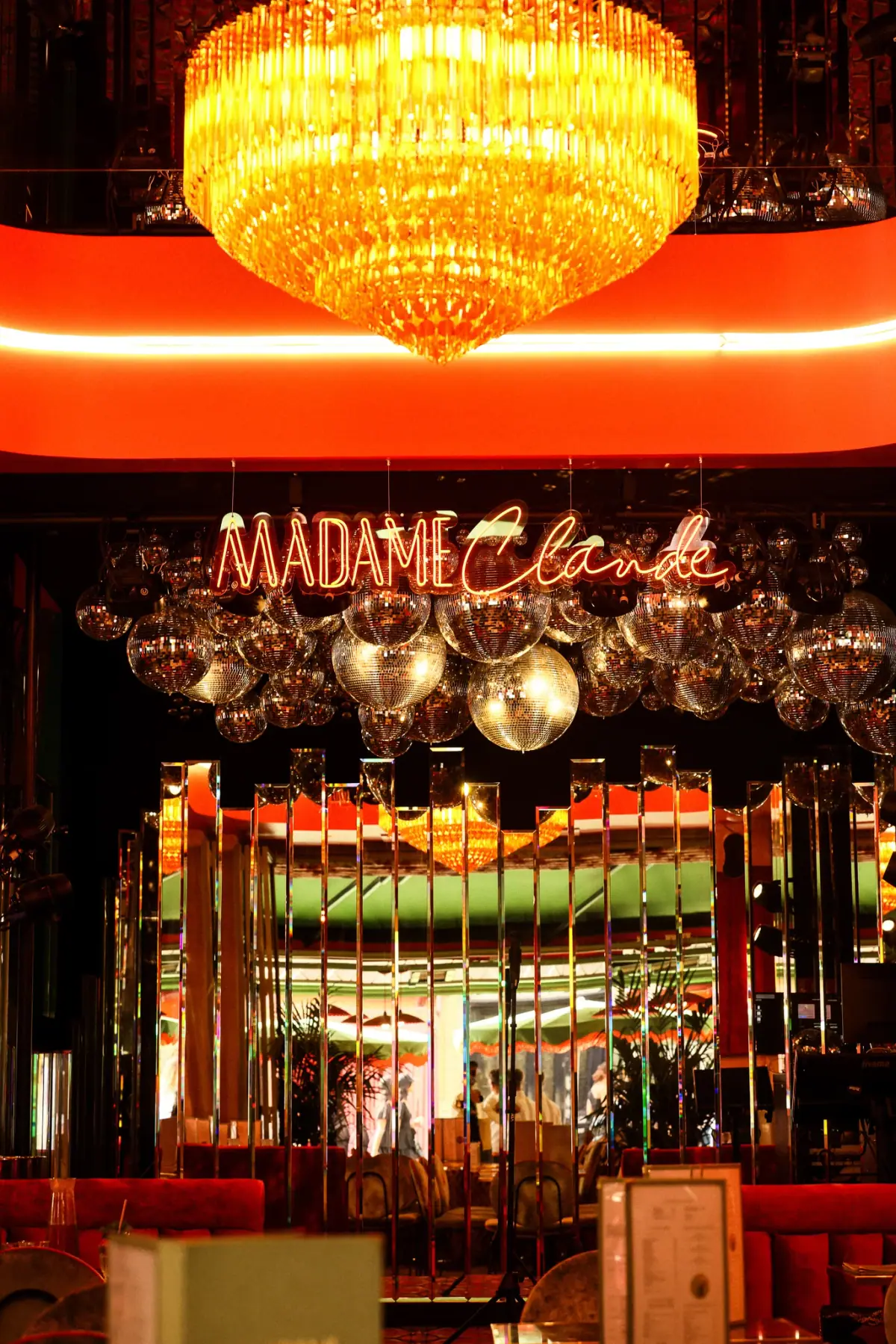 Madame Claude restaurant in Paris: velvet banquettes and soft lighting